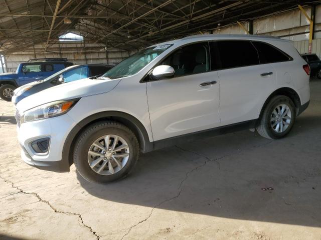 KIA SORENTO LX 2016 with VIN 5XYPG4A57GG112178 - Photo from auction