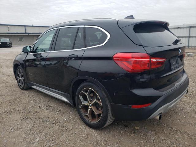 Photo 2 from auction – 2016 BMW X1 XDRIVE2 with VIN WBXHT3C34G5E56961