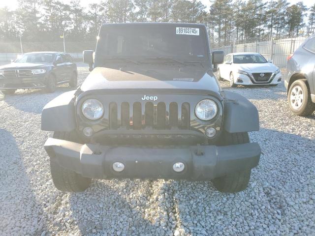 Photo 5 from auction – 2014 JEEP WRANGLER U with VIN 1C4BJWDG6EL176248