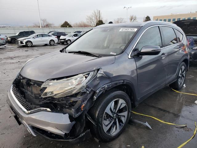 HONDA CR-V TOURI 2016 with VIN 5J6RM4H93GL060167 - Photo from auction