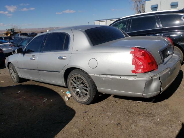 Photo 2 from auction – 2004 LINCOLN TOWN CAR U with VIN 1LNHM83W94Y659204