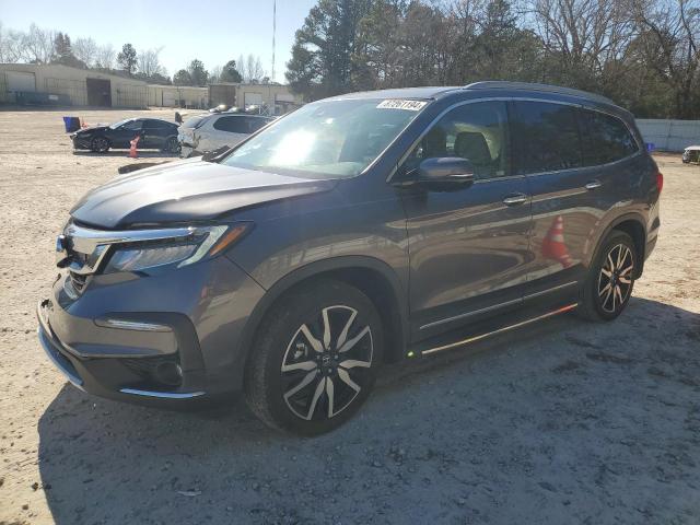 Photo 1 from auction – 2021 HONDA PILOT TOUR with VIN 5FNYF5H64MB014014