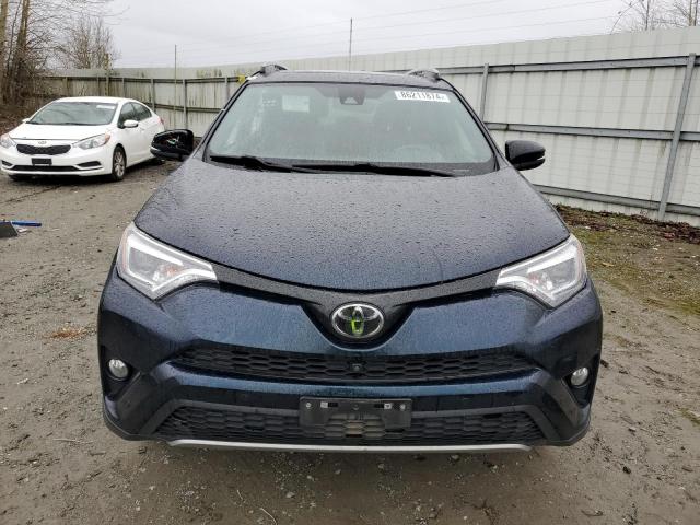 Photo 5 from auction – 2018 TOYOTA RAV4 SE with VIN JTMJFREV6JD254964