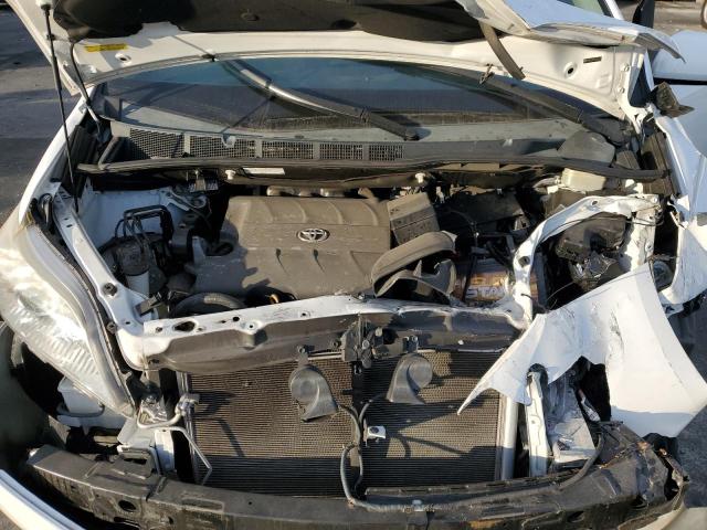 Photo 12 from auction – 2015 TOYOTA SIENNA LE with VIN 5TDKK3DC5FS673199