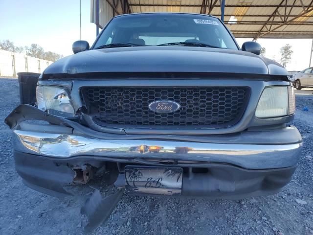 Photo 5 from auction – 2003 FORD F150 with VIN 2FTRX07W23CA18364