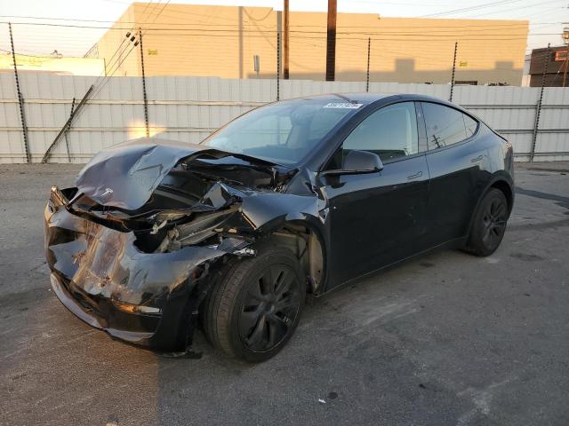 TESLA MODEL Y 2024 with VIN 7SAYGDED1RF132087 - Photo from auction