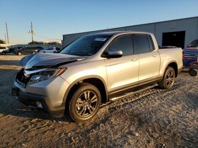HONDA RIDGELINE 2020 with VIN 5FPYK3F13LB023140 - Photo from auction