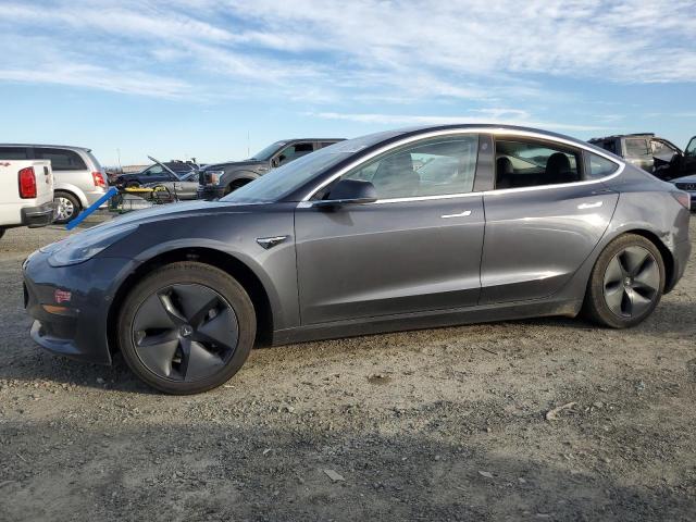 TESLA MODEL 3 2018 with VIN 5YJ3E1EA7JF101576 - Photo from auction