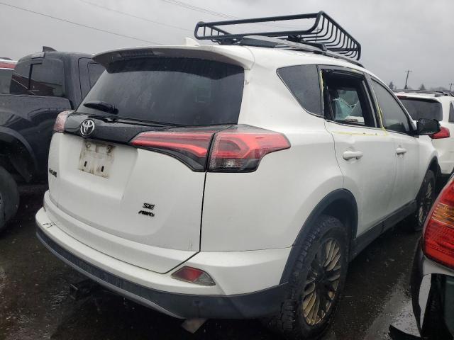 Photo 3 from auction – 2017 TOYOTA RAV4 SE with VIN JTMJFREV3HJ143235
