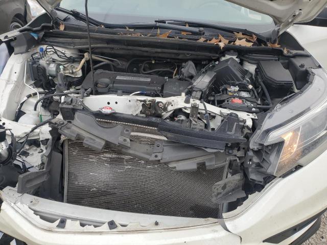 Photo 12 from auction – 2015 HONDA CR-V LX with VIN 5J6RM3H35FL022928
