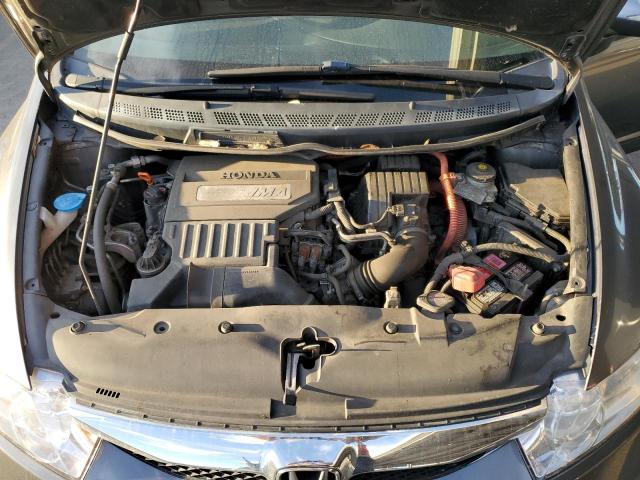 Photo 11 from auction – 2010 HONDA CIVIC HYBR with VIN JHMFA3F20AS006676