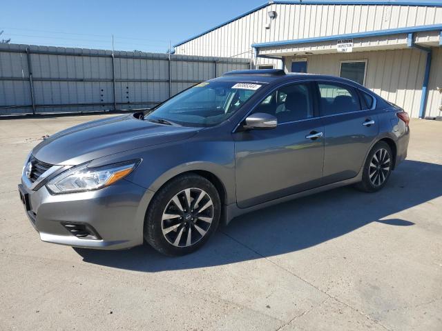 NISSAN ALTIMA 2018 with VIN 1N4AL3AP0JC232189 - Photo from auction