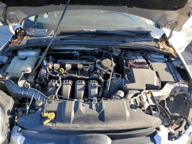 Фото 11 с аукциона – 2014 FORD FOCUS SE с VIN 1FADP3F22EL272309