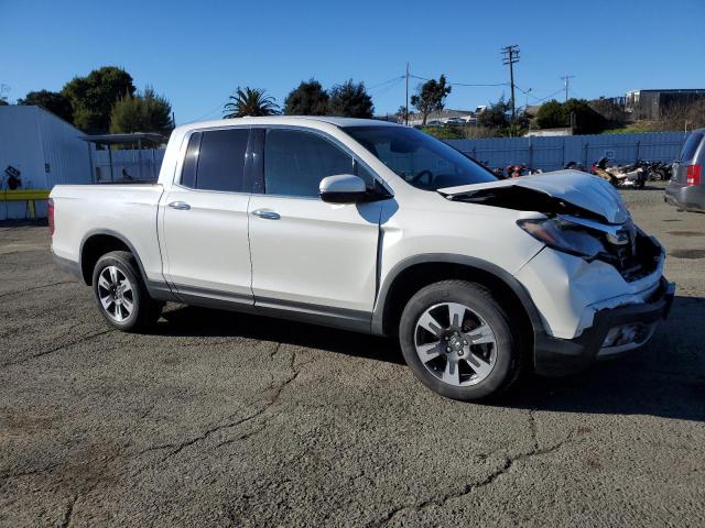 Photo 4 from auction – 2019 HONDA RIDGELINE with VIN 5FPYK3F73KB012948