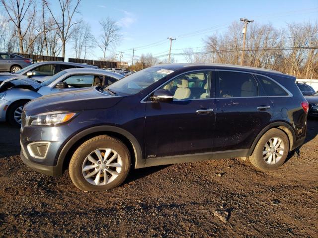 KIA SORENTO LX 2018 with VIN 5XYPGDA31JG370153 - Photo from auction