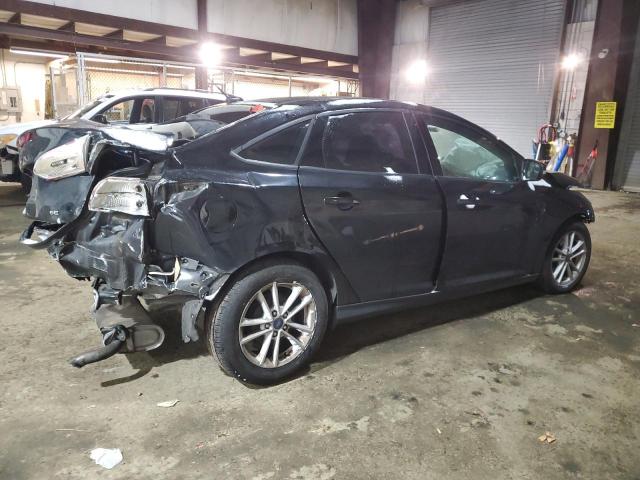 Photo 3 from auction – 2016 FORD FOCUS SE with VIN 1FADP3F21GL368371
