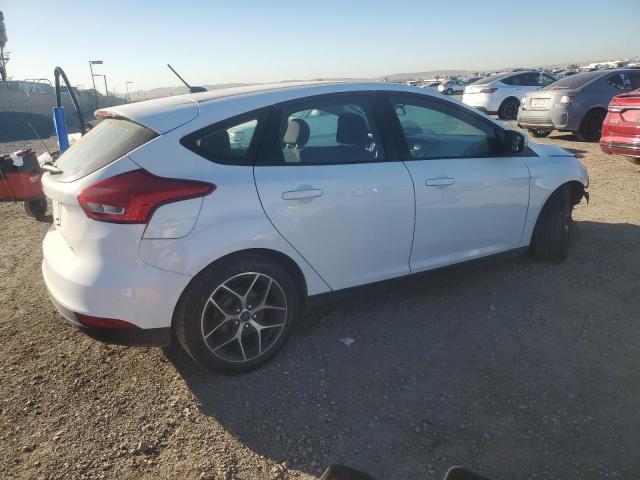 Photo 3 from auction – 2016 FORD FOCUS SE with VIN 1FADP3K21GL246454