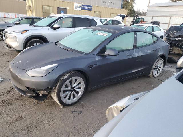 TESLA MODEL 3 2022 with VIN 5YJ3E1EAXNF286860 - Photo from auction