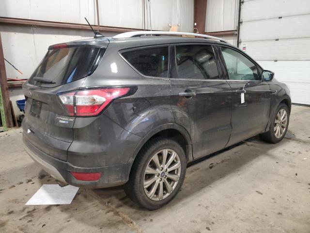Photo 3 from auction – 2018 FORD ESCAPE TIT with VIN 1FMCU9J96JUA37644