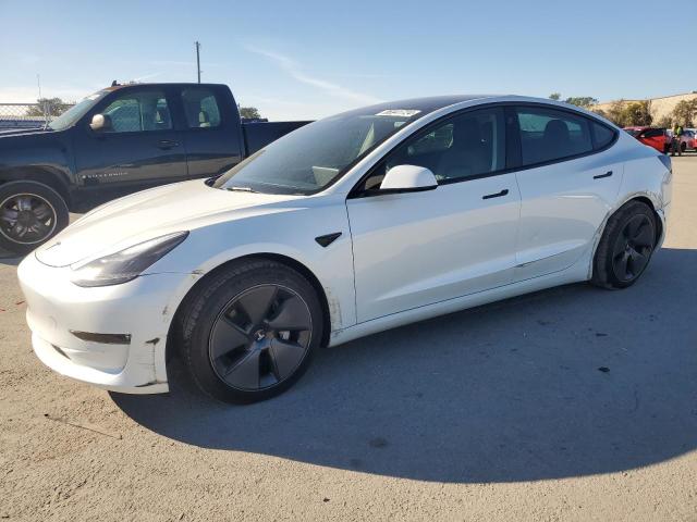 TESLA MODEL 3 2022 with VIN 5YJ3E1EB2NF103976 - Photo from auction