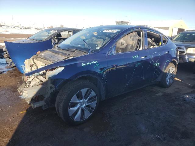 TESLA MODEL Y 2023 with VIN 7SAYGAEE2PF910238 - Photo from auction