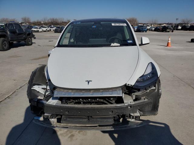 Photo 5 from auction – 2022 TESLA MODEL Y with VIN 7SAYGDEE9NA015065