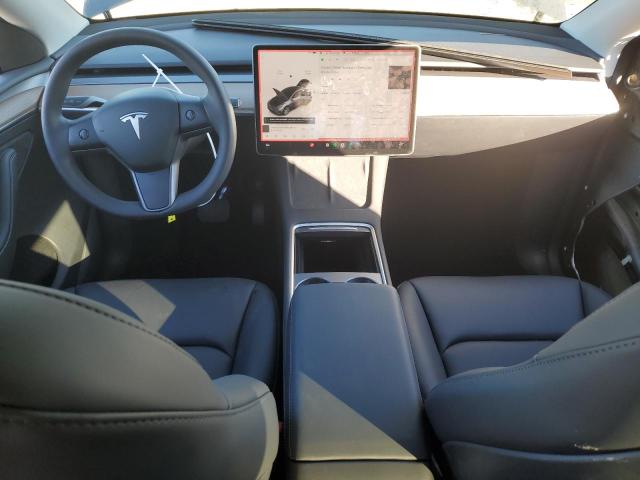 Photo 8 from auction – 2023 TESLA MODEL Y with VIN 7SAYGDED6PF979667