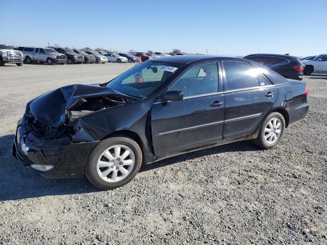 TOYOTA CAMRY LE 2003 with VIN 4T1BE32K73U195906 - Photo from auction