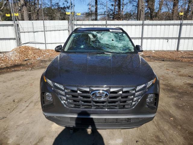 Photo 5 from auction – 2023 HYUNDAI TUCSON SEL with VIN 5NMJBCAE6PH266532