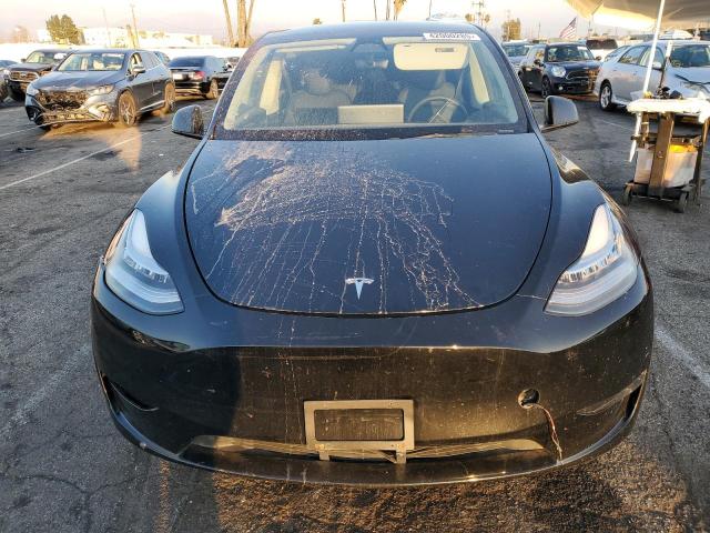 Photo 5 from auction – 2023 TESLA MODEL Y with VIN 7SAYGDEE7PA029050