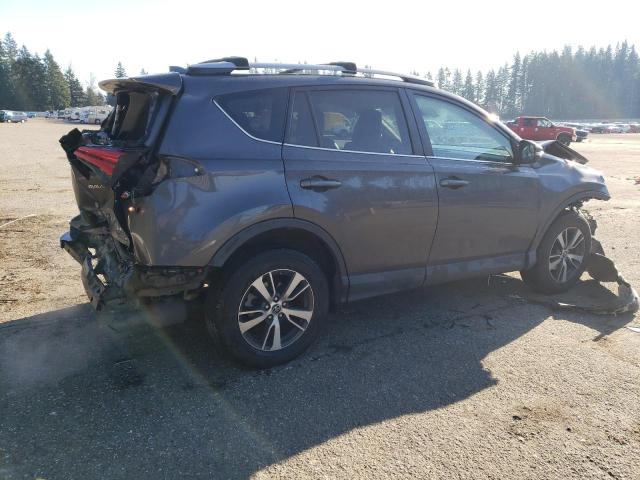 Photo 3 from auction – 2017 TOYOTA RAV4 XLE with VIN 2T3RFREV7HW576092
