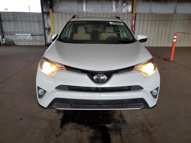 Photo 5 from auction – 2017 TOYOTA RAV4 XLE with VIN JTMWFREV5HD107387