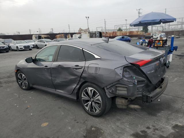 Photo 2 from auction – 2017 HONDA CIVIC EXL with VIN 2HGFC1F76HH656675