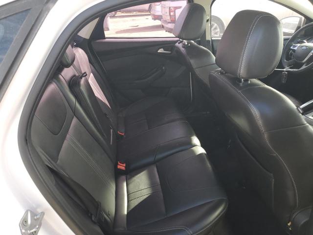 Photo 10 from auction – 2014 FORD FOCUS TITA with VIN 1FADP3J22EL161458