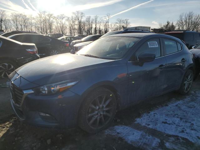 MAZDA 3 TOURING 2018 with VIN 3MZBN1L34JM252433 - Photo from auction