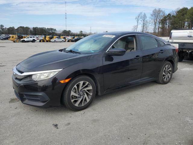 Photo 1 from auction – 2018 HONDA CIVIC EX with VIN 19XFC2F79JE032939