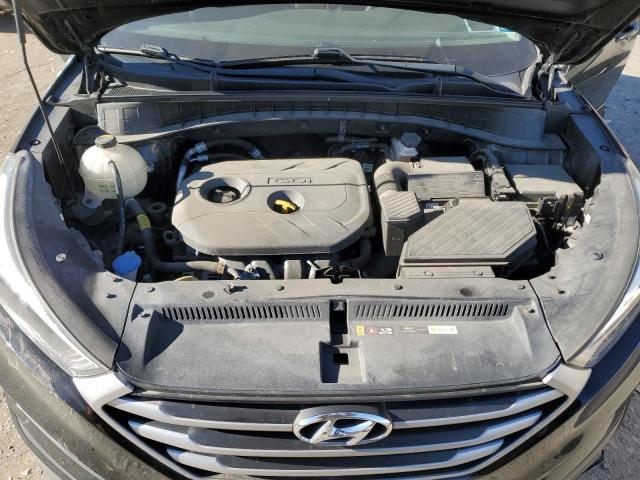 Photo 12 from auction – 2018 HYUNDAI TUCSON SE with VIN KM8J2CA43JU632952