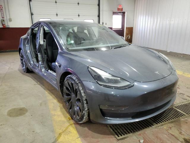 Photo 4 from auction – 2021 TESLA MODEL 3 with VIN 5YJ3E1EC0MF088806