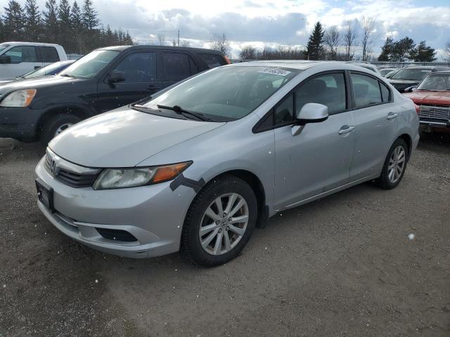 HONDA CIVIC LX 2012 with VIN 2HGFB2E55CH052536 - Photo from auction