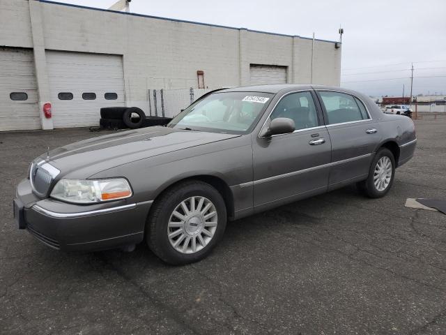 LINCOLN TOWN CAR E 2004 with VIN 1LNHM81W84Y667684 - Photo from auction