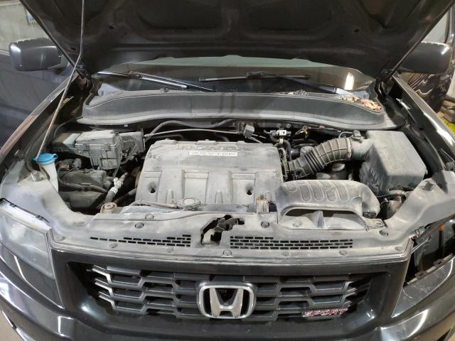 Photo 11 from auction – 2014 HONDA RIDGELINE with VIN 5FPYK1F71EB014867