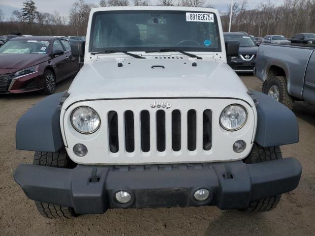 Photo 5 from auction – 2014 JEEP WRANGLER U with VIN 1C4BJWDG1EL106303