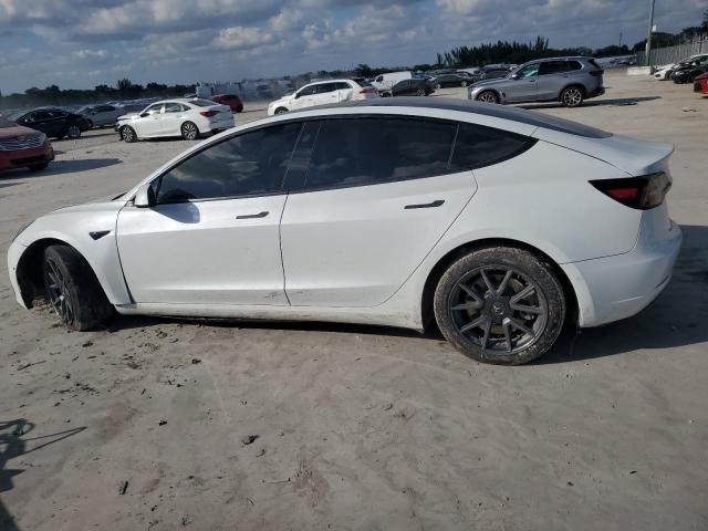 Photo 2 from auction – 2021 TESLA MODEL 3 with VIN 5YJ3E1EA9MF922845