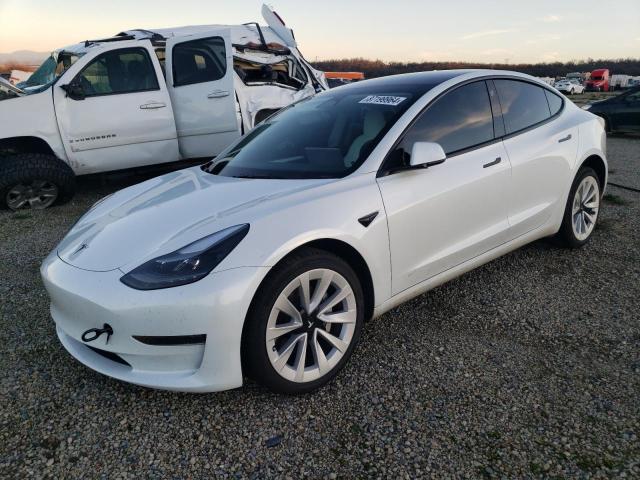TESLA MODEL 3 2023 with VIN 5YJ3E1EA2PF665175 - Photo from auction