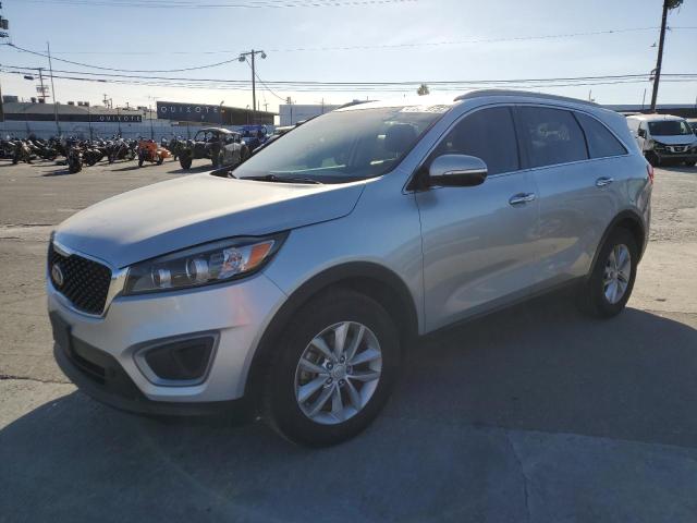 KIA SORENTO LX 2016 with VIN 5XYPG4A32GG002590 - Photo from auction