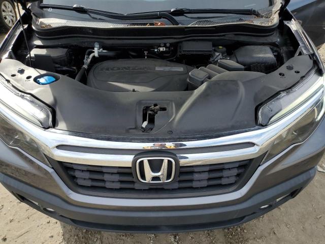 Photo 11 from auction – 2017 HONDA RIDGELINE with VIN 5FPYK2F6XHB007921