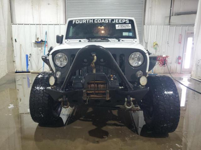 Photo 5 from auction – 2016 JEEP WRANGLER U with VIN 1C4BJWDG4GL136818