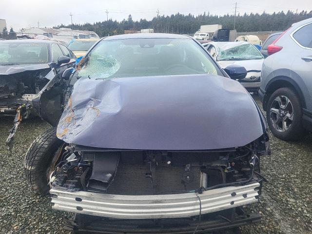Photo 5 from auction – 2021 TOYOTA COROLLA LE with VIN 5YFBPMBE4MP205319