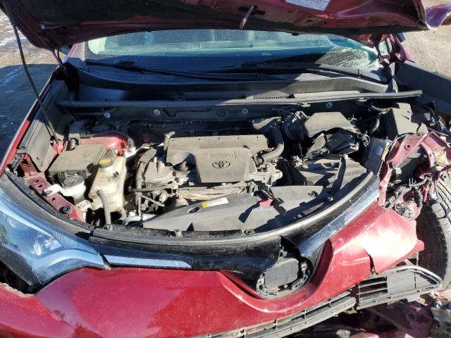 Photo 12 from auction – 2018 TOYOTA RAV4 LE with VIN 2T3BFREV2JW717173