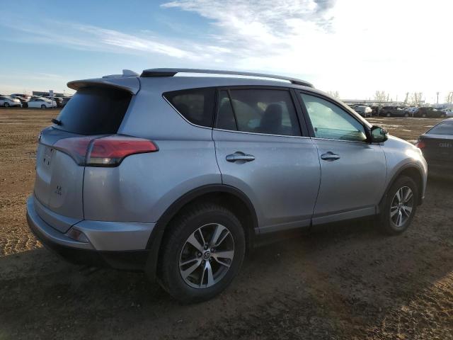 Photo 3 from auction – 2018 TOYOTA RAV4 LE with VIN 2T3BFREV9JW840730